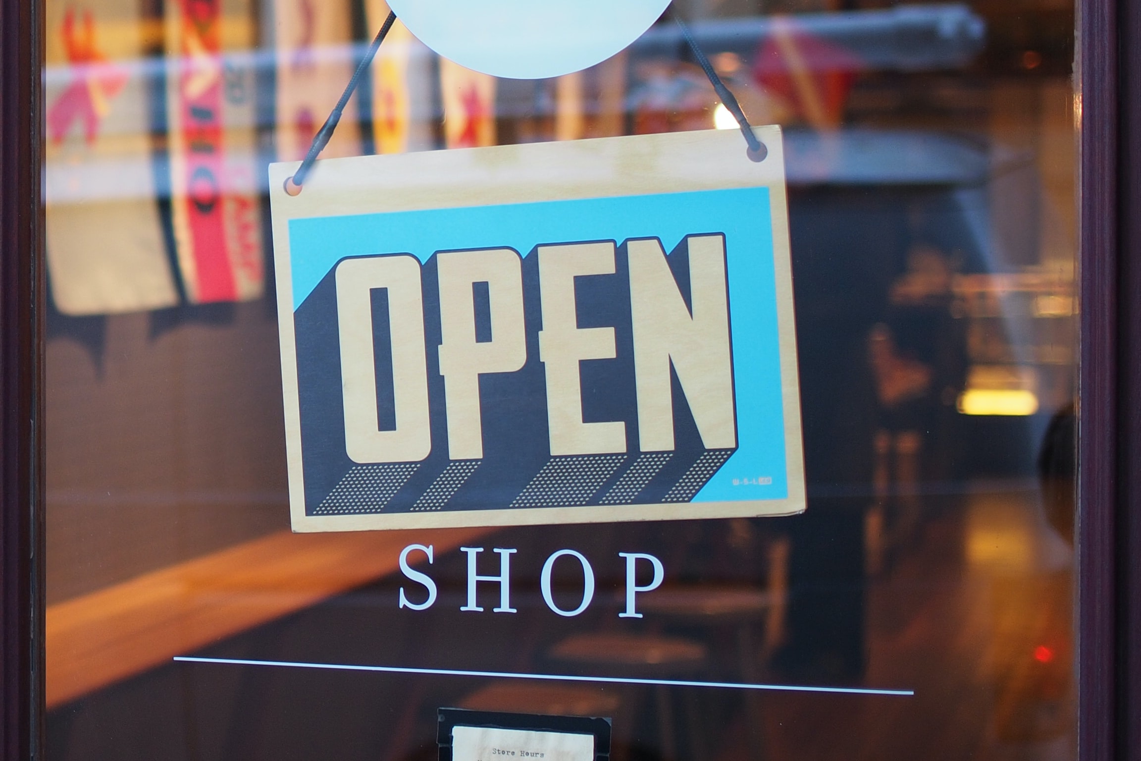 shop open sign on window