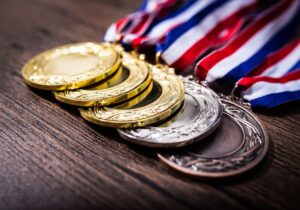 经济学家札记：一枚巴黎奥运会金牌“价值”几何？