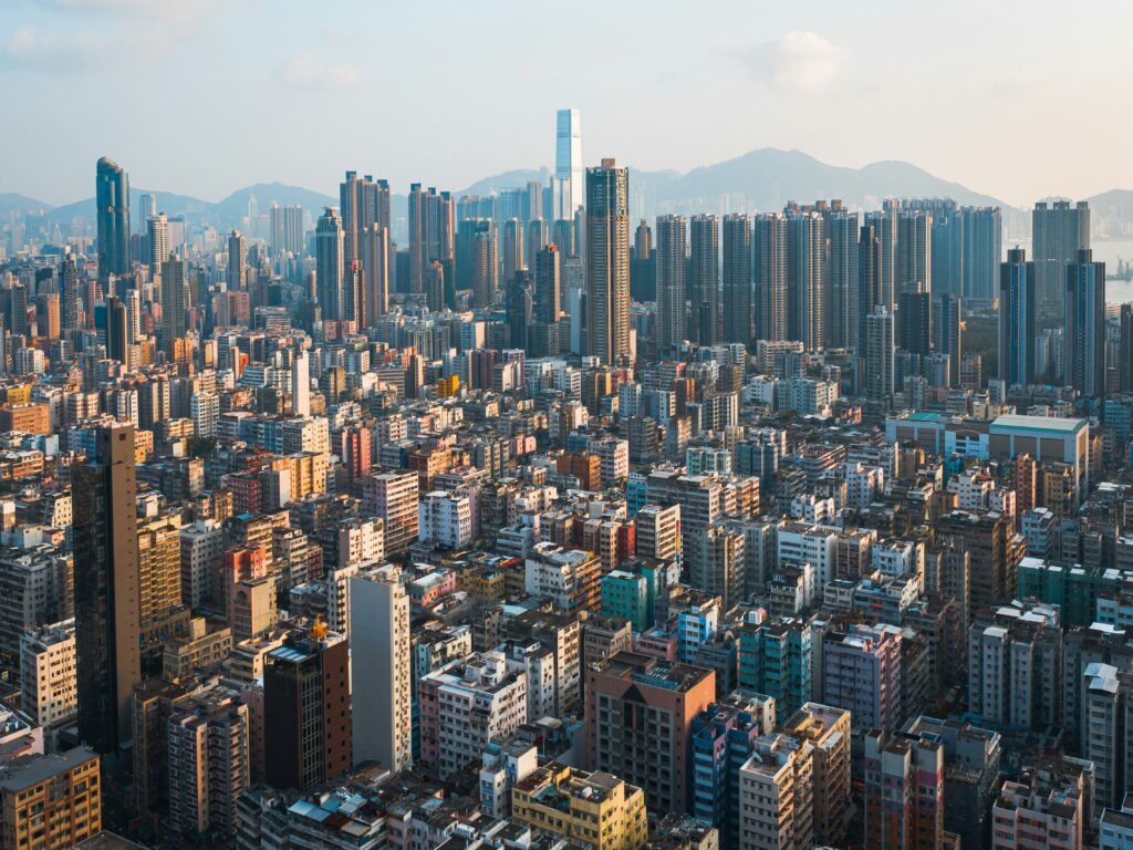 Aerial view of the dense urban area of Hong Kong on a sunny day

