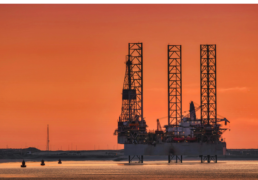Higher energy prices weigh on output, while AI demand pushes up growth